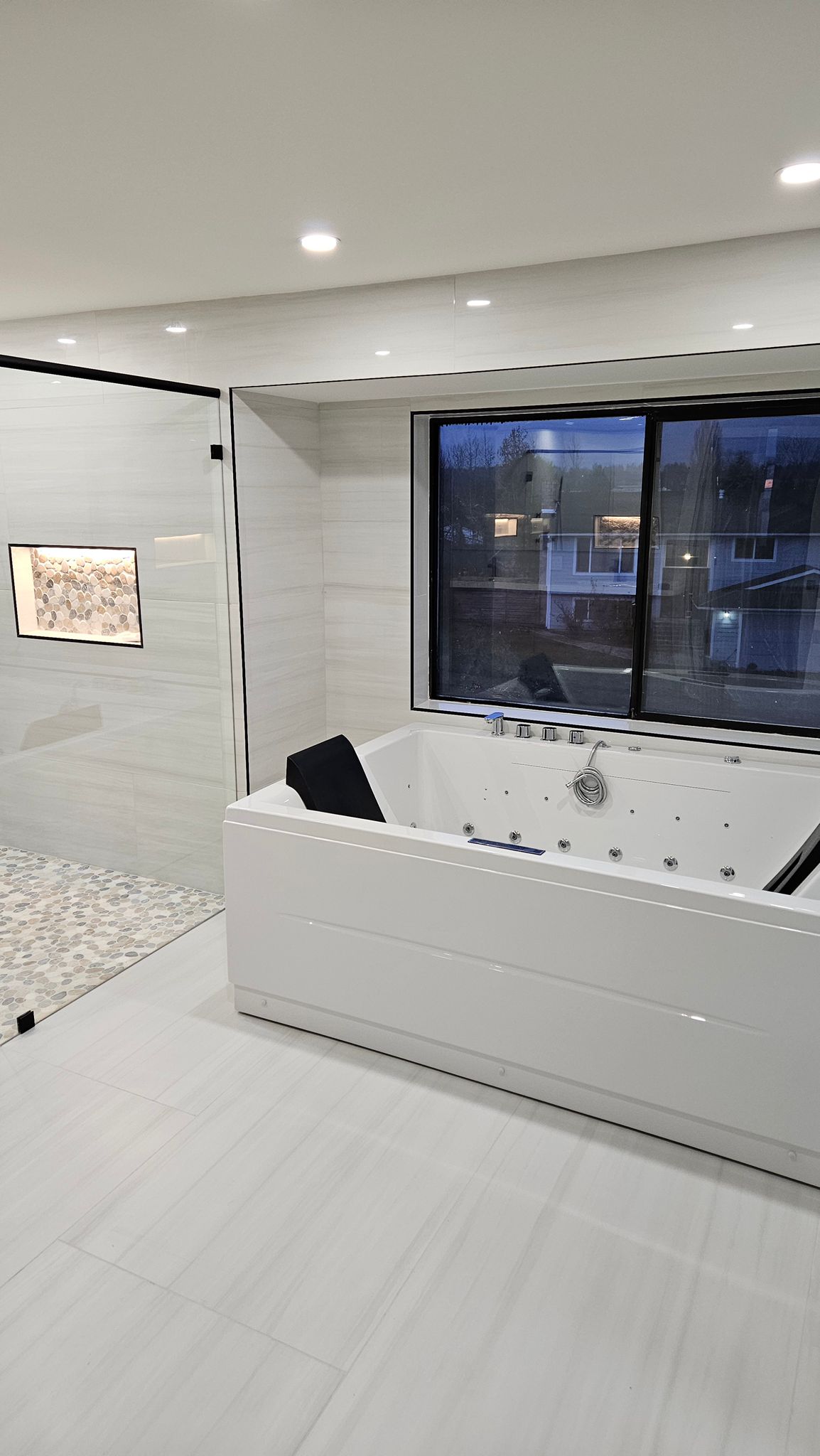 Soaking tub under the window