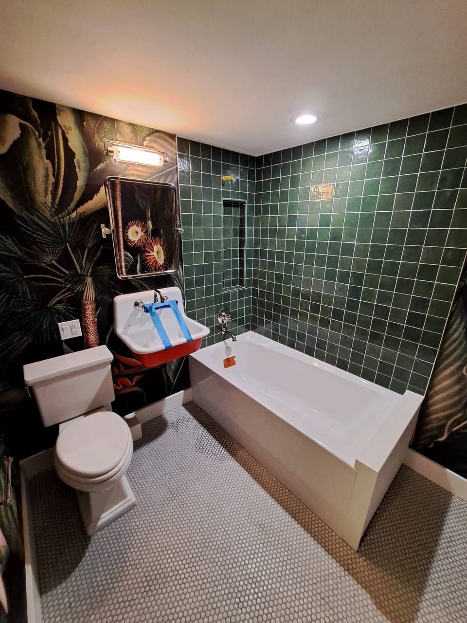 Green tile guest bathroom
